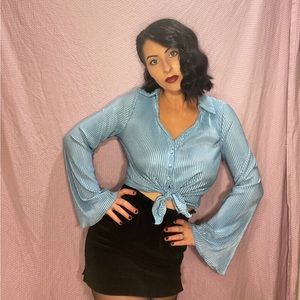 Baby blue satiny ribbed button up top with bell sleeves. New without tags 🦋
